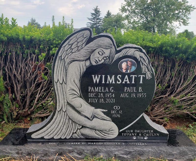 Wimsatt Heart shaped stone with embracing angel design